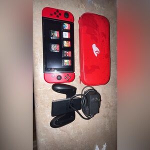Nintendo switch lite with 7 games without box de games